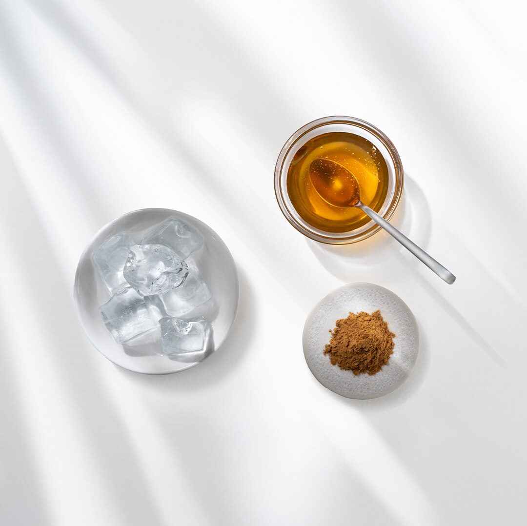 Iced Honey Cappuccino next to ingredients